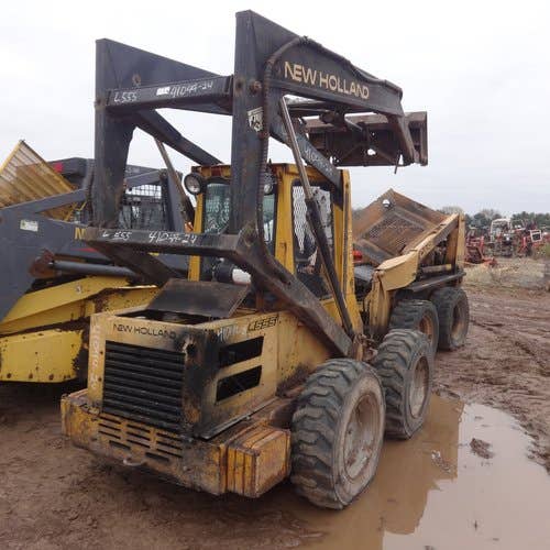 Used New Holland l555 Skid Steer Loader parts.