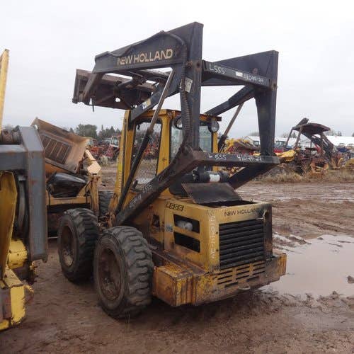 Used New Holland l555 Skid Steer Loader parts.