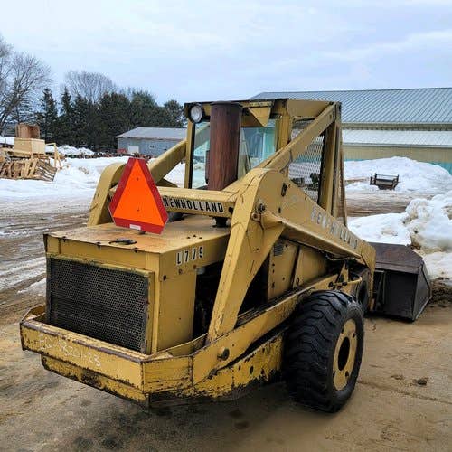 Used New Holland L779 Skid Steer Loader parts.