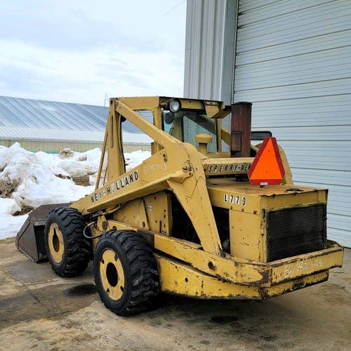 Used New Holland L779 Skid Steer Loader parts.