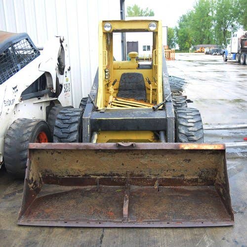 Used New Holland L781 Skid Steer Loader parts.