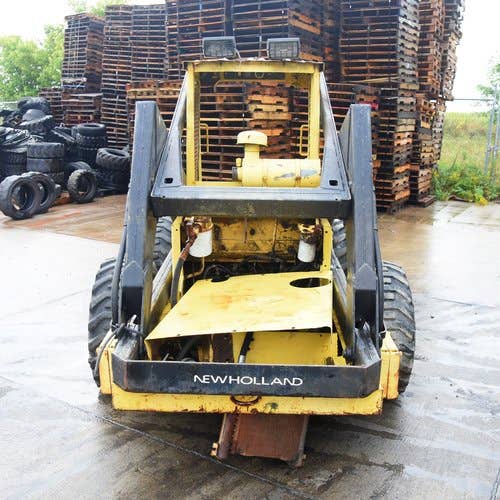 Used New Holland L781 Skid Steer Loader parts.