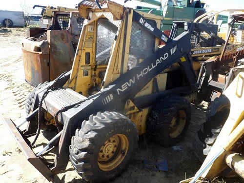 Used New Holland L783 Skid Steer Loader parts.