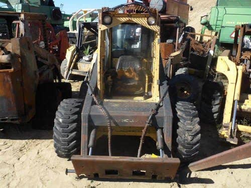 Used New Holland L783 Skid Steer Loader parts.