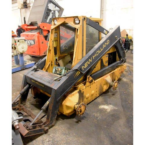 1991 Used New Holland L783 Skid Steer Loader parts.