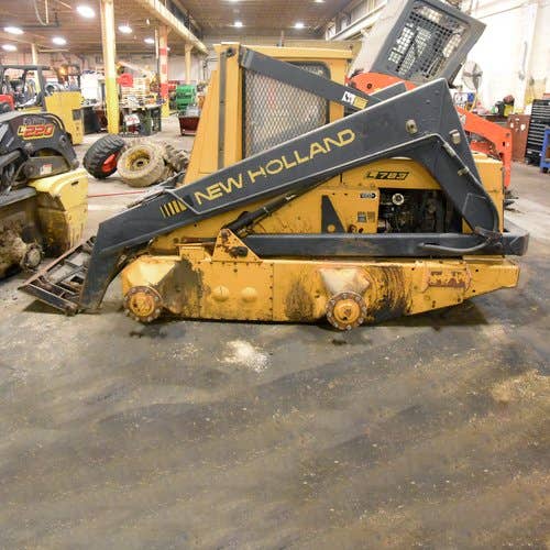 1991 Used New Holland L783 Skid Steer Loader parts.