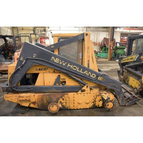 1991 Used New Holland L783 Skid Steer Loader parts.