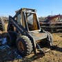 Used New Holland L783 Skid Steer Loader parts. Used New Holland L783 Skid Steer Loader parts.