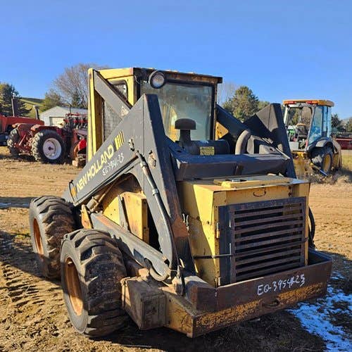 Used New Holland L783 Skid Steer Loader parts.