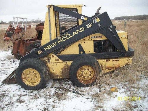 Used New Holland L785 Skid Steer Loader parts.