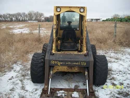 Used New Holland L785 Skid Steer Loader parts.