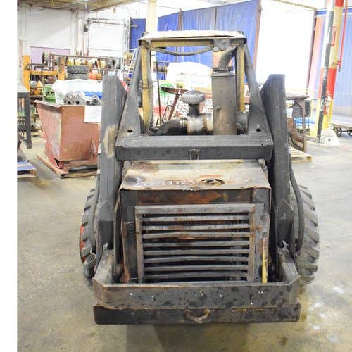 1990 Used New Holland L785 Skid Steer Loader parts.