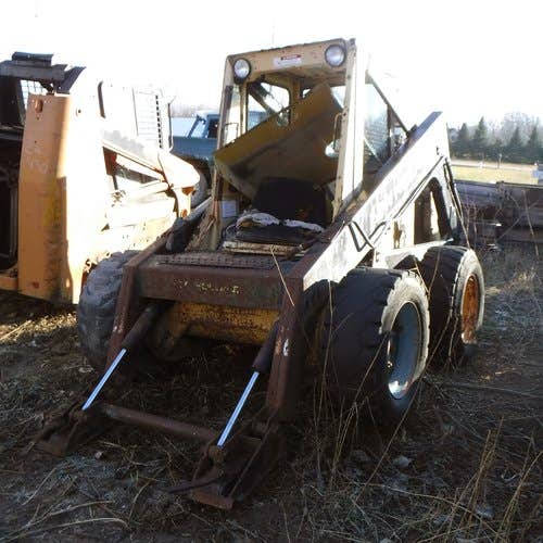 Used New Holland l785 Skid Steer Loader parts.
