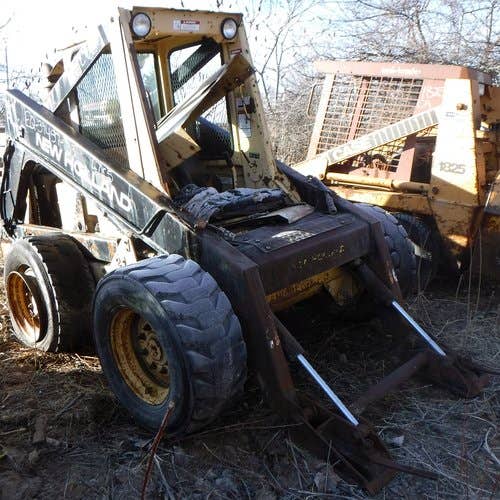 Used New Holland l785 Skid Steer Loader parts.