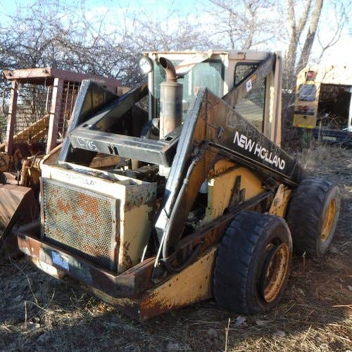 Used New Holland l785 Skid Steer Loader parts.