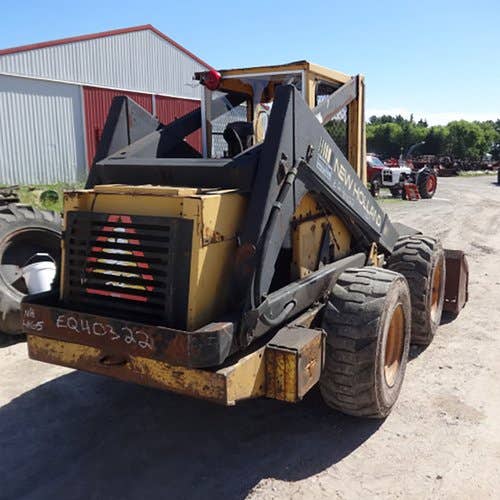 Used New Holland L785 Skid Steer Loader parts.