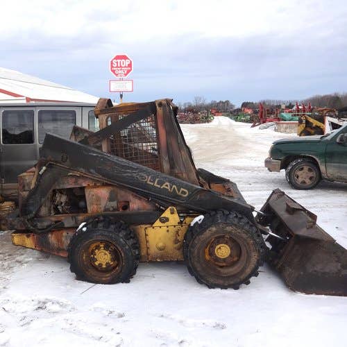 Used New Holland L785 Skid Steer Loader parts.