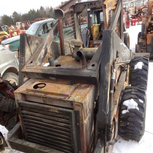 Used New Holland L785 Skid Steer Loader parts.