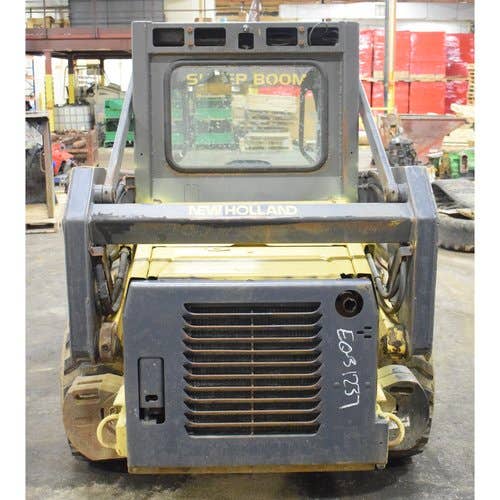 Used New Holland LS140 Skid Steer Loader parts.