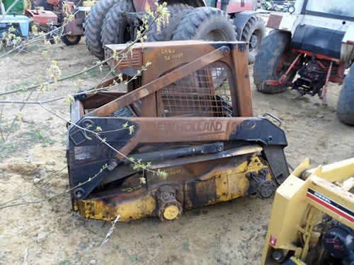 Used New Holland LS160 Skid Steer Loader parts.