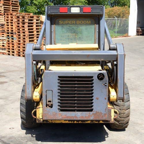 Used New Holland LS170 Skid Steer Loader parts.