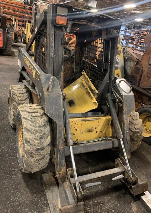 Used New Holland LS170 Skid Steer Loader parts.