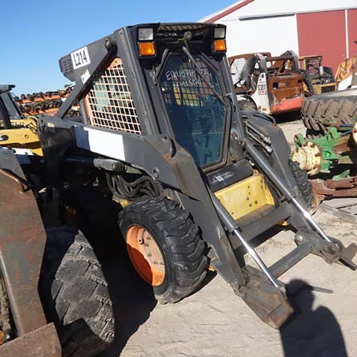 Used New Holland LS170 Skid Steer Loader parts.