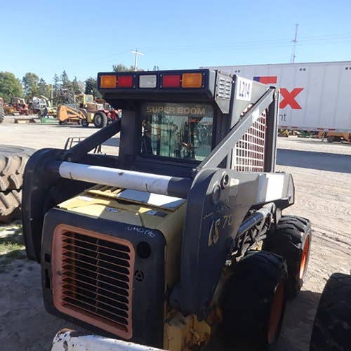 Used New Holland LS170 Skid Steer Loader parts.