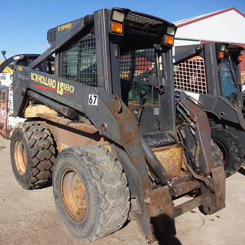 Used New Holland LS180 Skid Steer Loader parts.