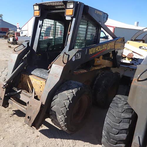 Used New Holland LS180 Skid Steer Loader parts.