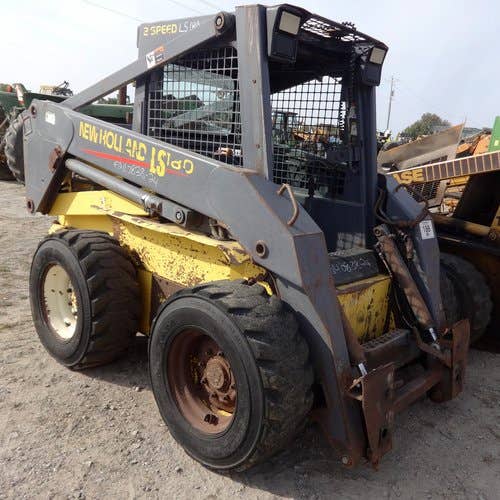 Used New Holland LS180 Skid Steer Loader parts.