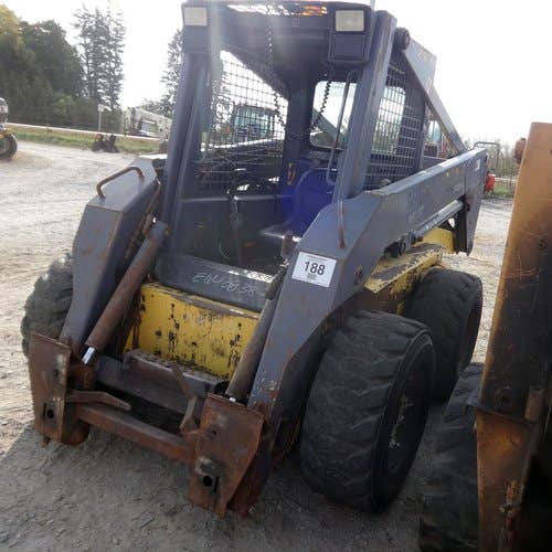 Used New Holland LS180 Skid Steer Loader parts.