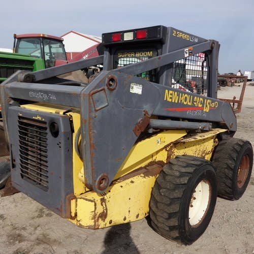 Used New Holland LS180 Skid Steer Loader parts.