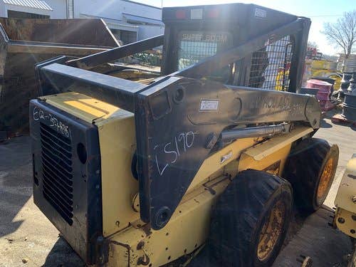 Used New Holland ls190 Skid Steer Loader parts.