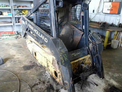 Used New Holland LX565 Skid Steer Loader parts.