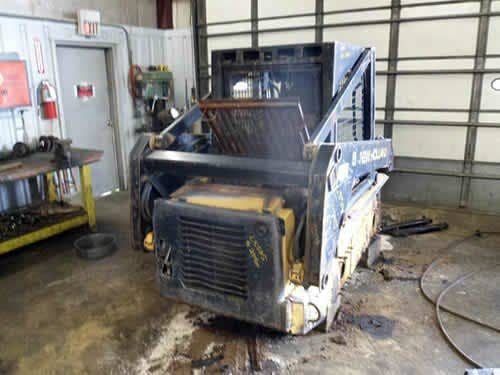 Used New Holland LX565 Skid Steer Loader parts.