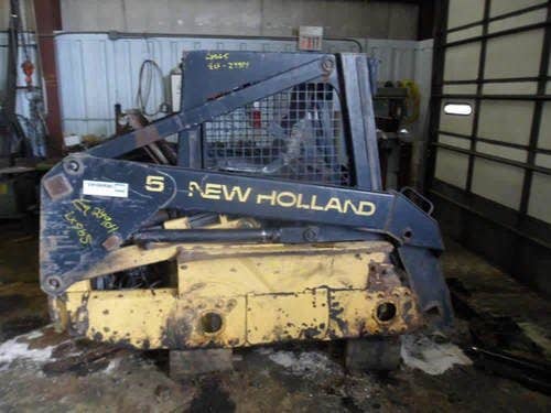 Used New Holland LX565 Skid Steer Loader parts.