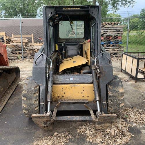 Used New Holland LX665 Skid Steer Loader parts.