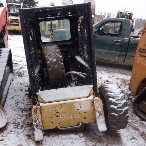 Used New Holland LX665 Skid Steer Loader parts.