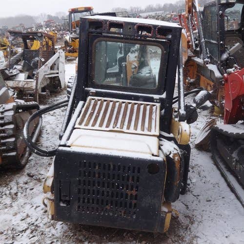 Used New Holland LX665 Skid Steer Loader parts.