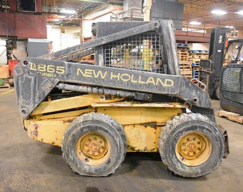 Used New Holland LX865 Skid Steer Loader parts.