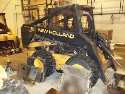 Used New Holland Lx885 Skid Steer Loader parts.