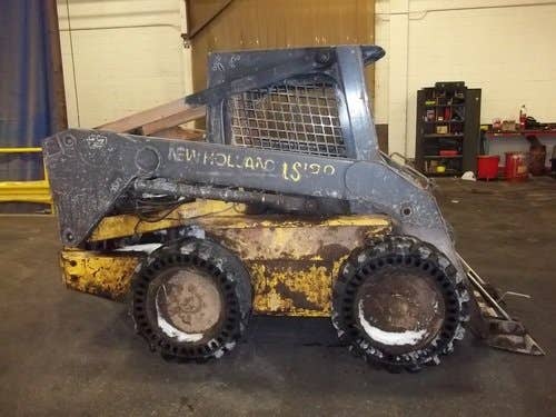 Used New Holland lx885 Skid Steer Loader parts.