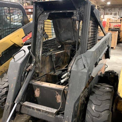 Used New Holland LX885 Skid Steer Loader parts.