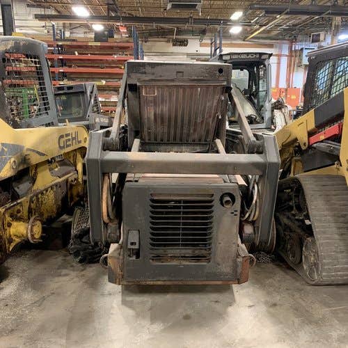 Used New Holland LX885 Skid Steer Loader parts.