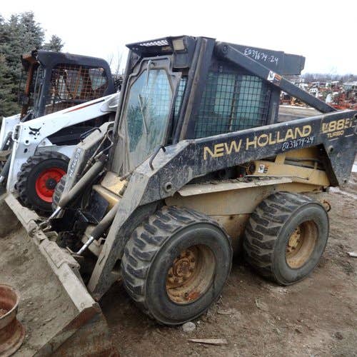 Used New Holland LX885 Skid Steer Loader parts.