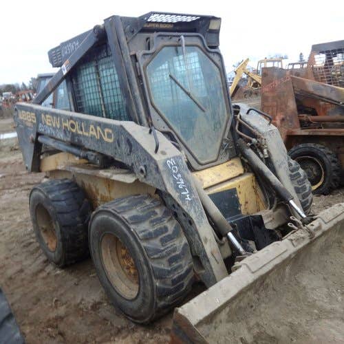 Used New Holland LX885 Skid Steer Loader parts.