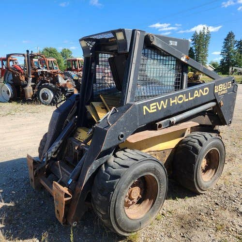 Used New Holland LX885 Skid Steer Loader parts.