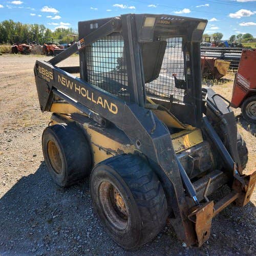 Used New Holland LX885 Skid Steer Loader parts.