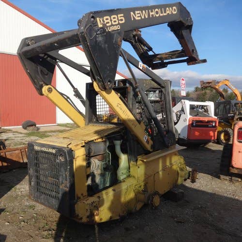 Used New Holland LX885 Skid Steer Loader parts.